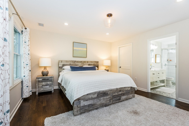 Open-concept living and kitchen staged for sale